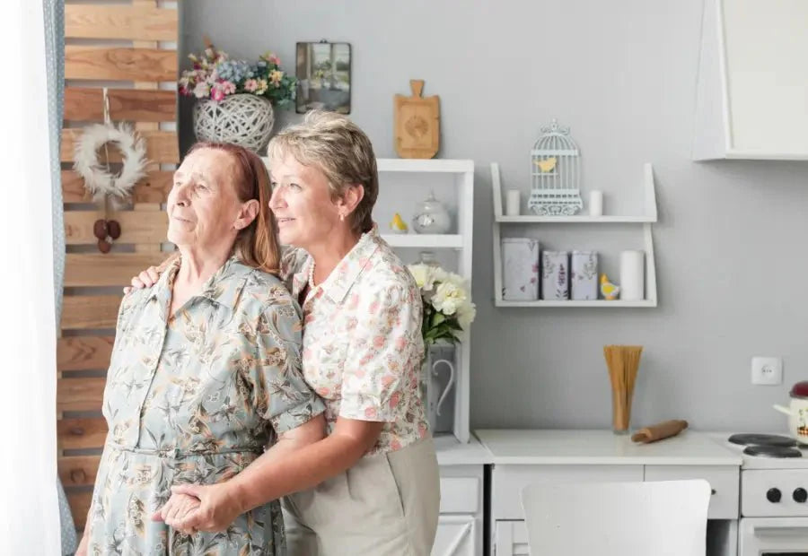 A woman is helping her elderly senior losing independence