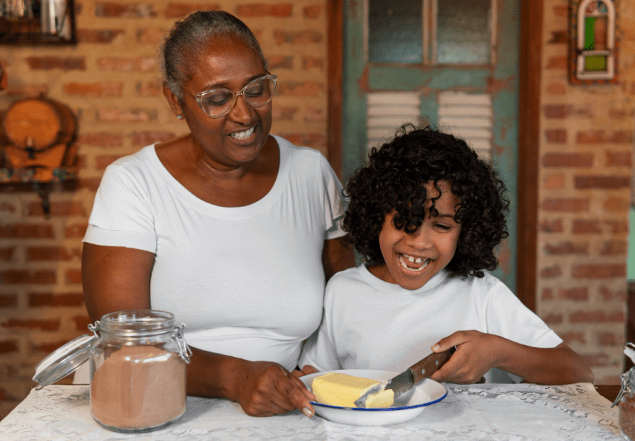 Grandmother doing a cooking activity with her grandson