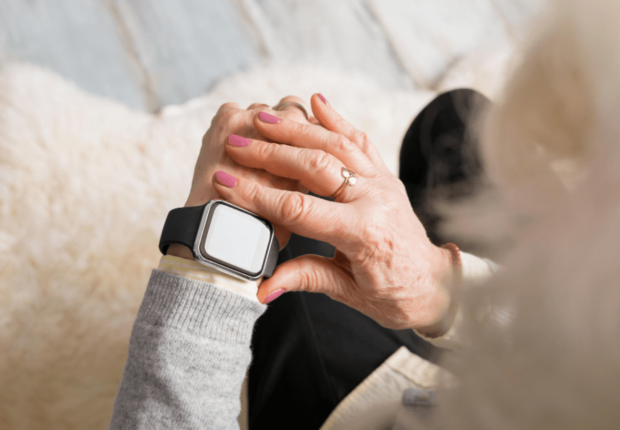 elderly woman wearing smart watch