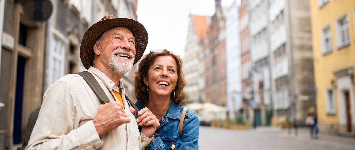 Senior parent on vacation with daughter exploring new city