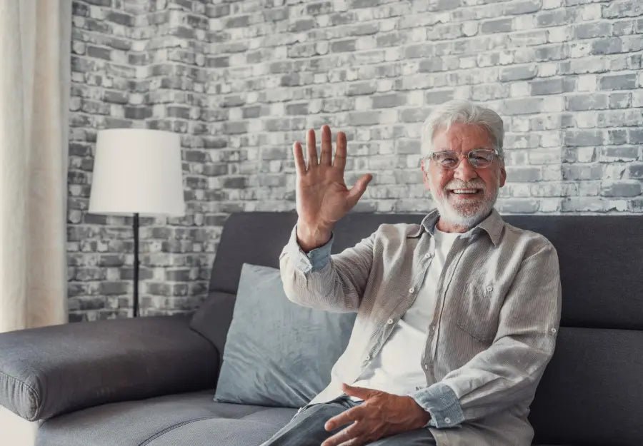 Man with dementia using video calling device for TV