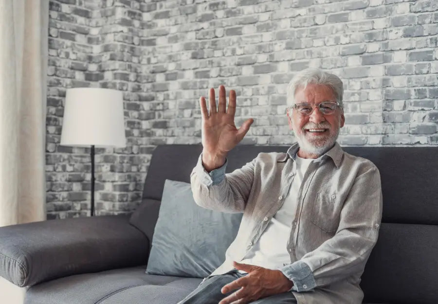 Man with dementia using video calling device for TV